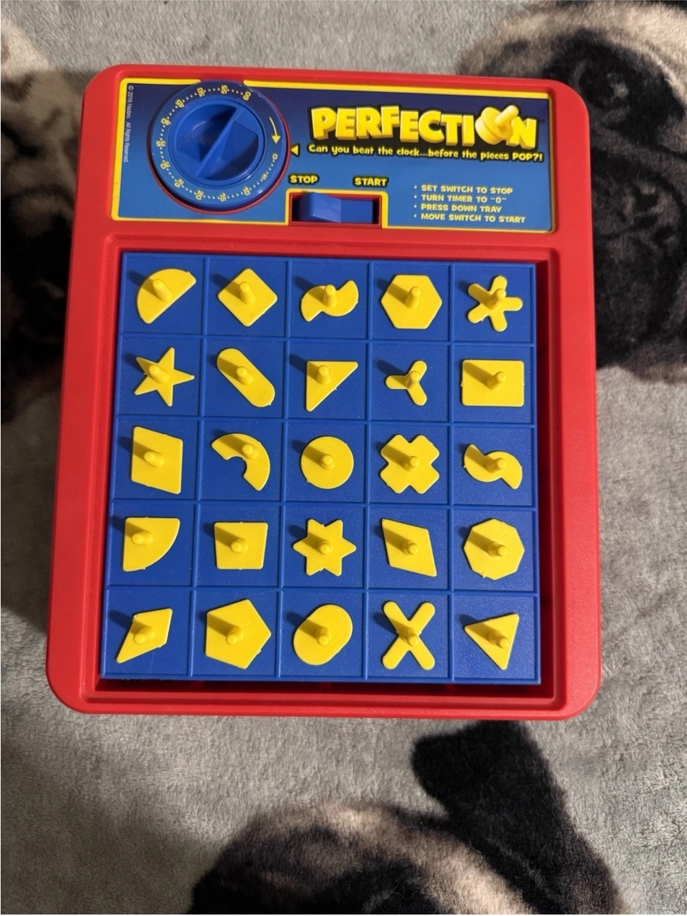 Perfection Board Game Red Blue Yellow Pieces